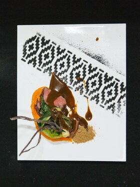 A plate of perfectly presented gourmet food