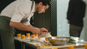 Jozef Youssef applying the finishing touches to a dish