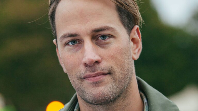 Tristram Stuart smiling into the camera